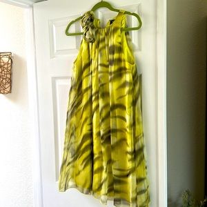 Greens and soft zebra vibe! Over head with hook and eye closure!